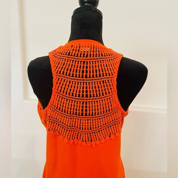 Orange sleeveless dress with crochet back. It’s a fitted dress - Picture 4 of 6